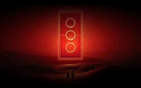 De twee Daft Punk-robots als LEGO minifiguren in een rood verlicht landschap